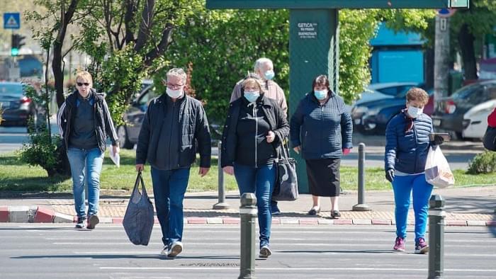 people-wearing-the-masks-protection-virus-crossing-street-pass-pedestrians.jpg