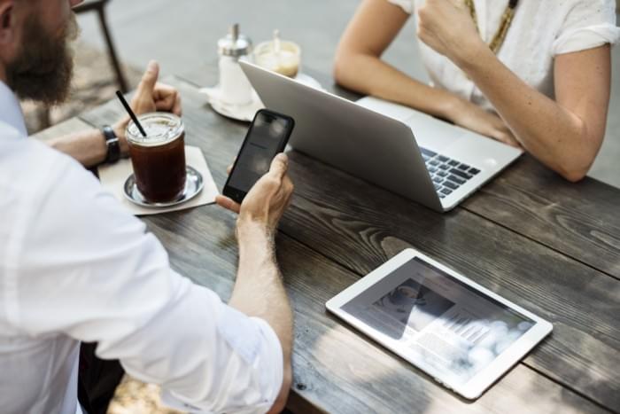 negative-space-desk-macbook-mobile-man-woman-rawpixel-thumb-1.jpg