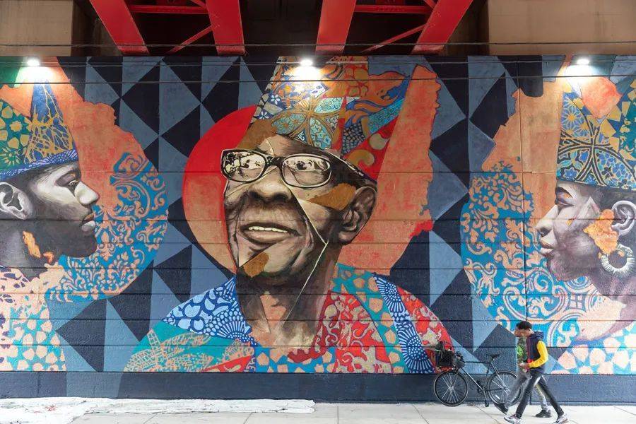 艺术家把本地居民的肖像画在社区街角。/Mural Arts Philadelphia<br>