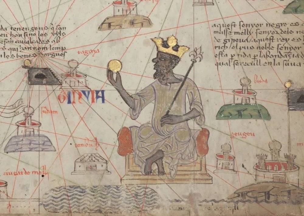 ◆曼萨·穆萨出现在1375年绘制的加泰罗尼亚地图集里，该地图集是描绘中世纪欧洲最重要的地图之一。图中的穆萨手举着一块硕大的金块。图片来源：Wikipedia<br>