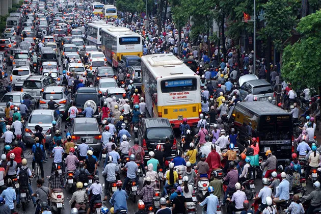 在越南的交通中，摩托车常常成为巨大变数<br label=图片备注 class=text-img-note>