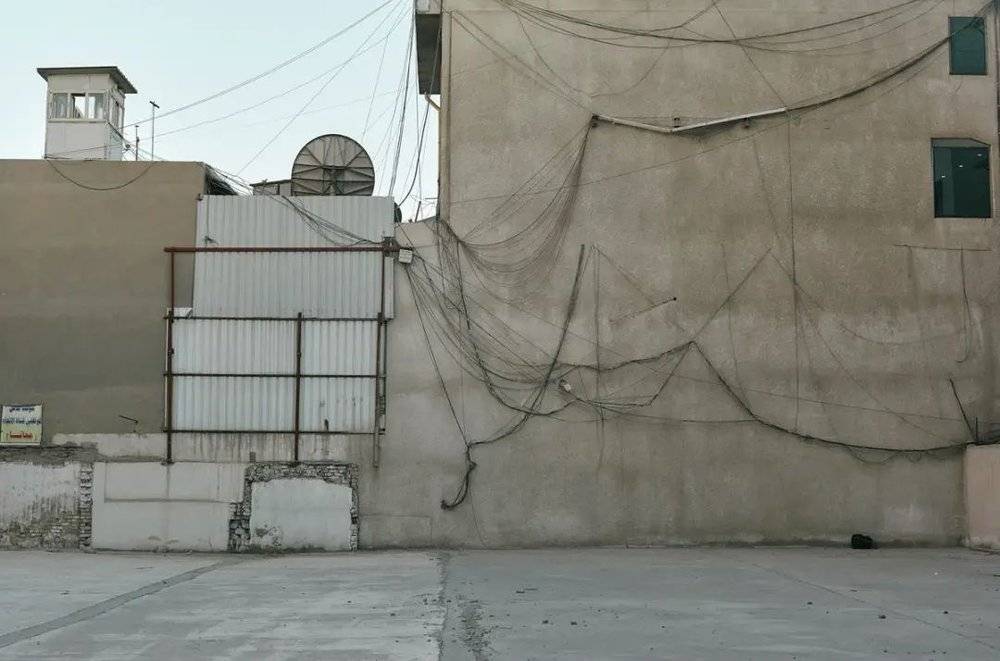 巴格达卡拉达，中产生活区乱拉的电线