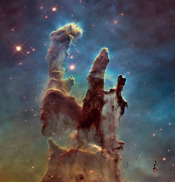 《创世之柱》，由哈勃望远镜拍摄合成最著名的照片之一<br>