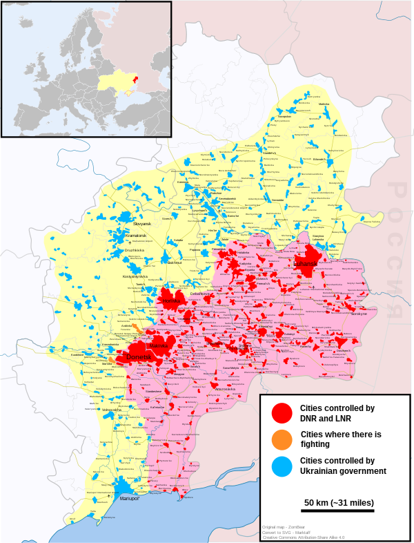 2021 年 11 月的乌东地区局势：红色地区为亲俄武装控制的地区；黄色及蓝色地区为原先曾被亲俄武装控制，但随后被乌政府军重夺的地区；橙色地区为双方当前交战及对峙的地区。