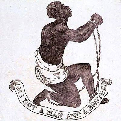 《难道我不是人？不是兄弟？》，1787年约书亚·威治伍德为英国废奴运动设计的奖章 (来源：zh.wikipedia.org）<br>