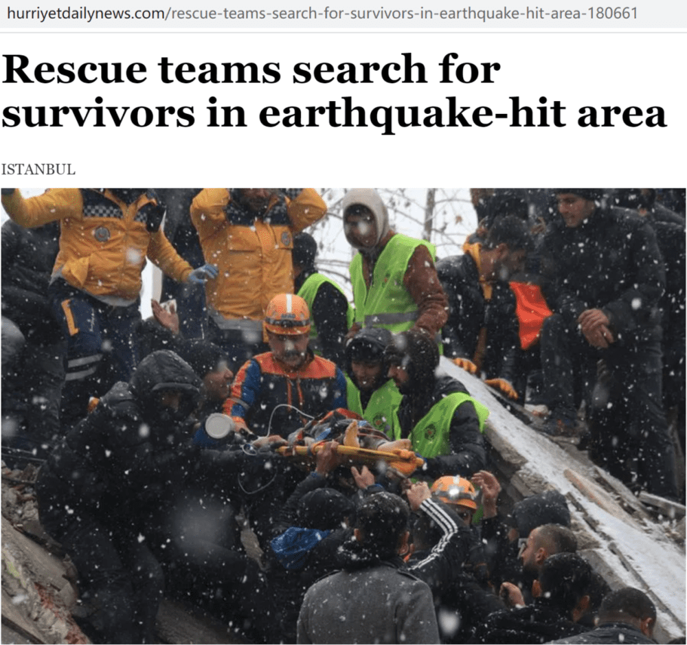 救援者冒雪搜寻幸存者 图片来源：土耳其Hürriyet Daily News